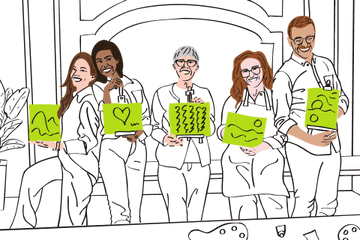Group of people displaying their paintings during an art class
